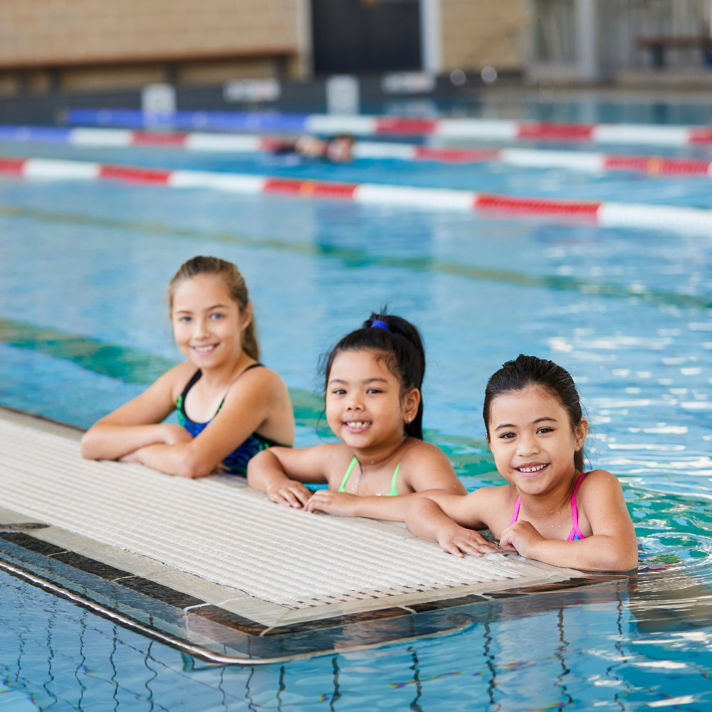Three young girls in swimming pool