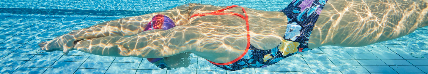 Underwater view of adult lap swimming