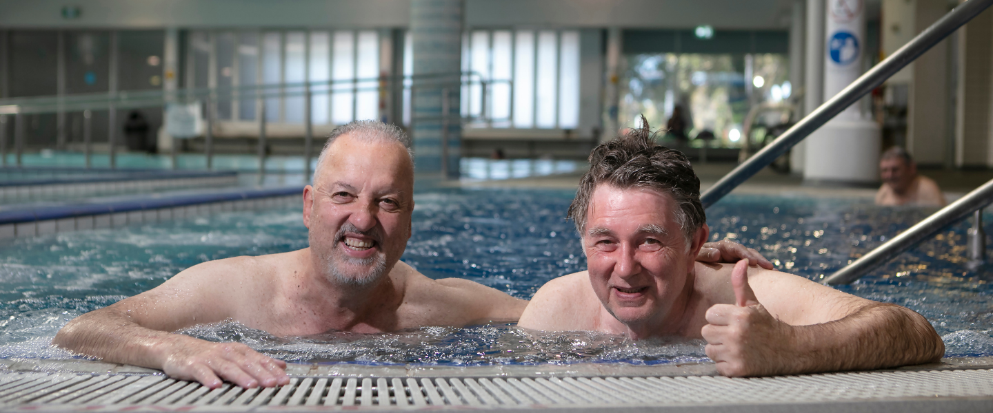 Two senior men enjoying spa