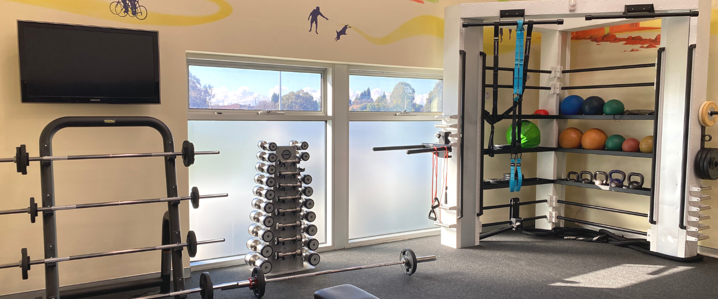 Women's gym space with numerous gym equipment