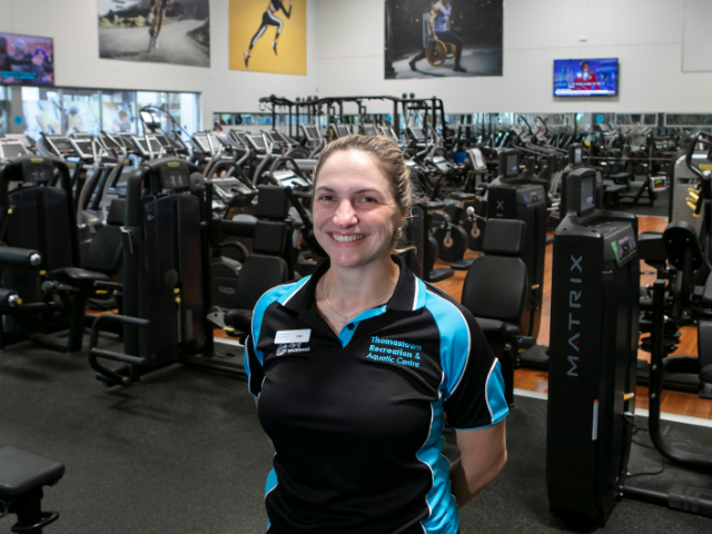 TRAC female staff member in main gym